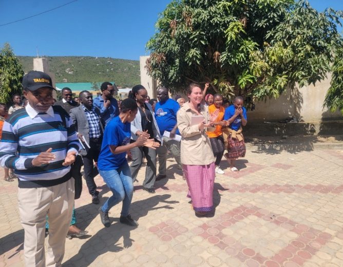 UNICEF AOR and other visitors participated in the local dance with the AGYWs during the welcoming to-group visit-Kitwiru ward.